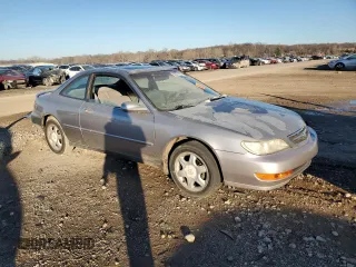 1997 Acura CL z VIN 19UYA1256VL005063, wystawiony jako Copart lot #83031204 z przebiegiem 120 250 mil mil oraz Szkoda całkowita • Salvage title. Historia ofert i sprzedaży dostępna na DreamBid. Obrazek 4.