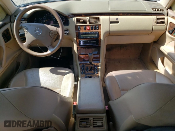 2000 Mercedes-Benz E-Class with VIN WDBJF65J2YB165568, listed as a Copart auction lot 70003994 with 146,518 mi miles and Salvage Title. Bid and sale history available at carsss.com. Image 8.