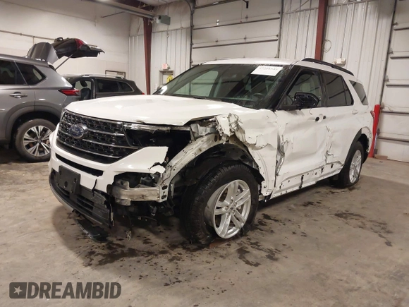 2022 Ford Explorer XLT z VIN 1FMSK8DH4NGB05636, wystawiony jako IAAI lot #42211545 z przebiegiem 55 366 mil mil oraz . Historia ofert i sprzedaży dostępna na DreamBid. Obrazek 21.