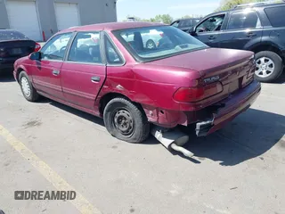 1993 Ford Taurus z VIN 1FACP52U4PG225521, wystawiony jako IAAI lot #42096535 z przebiegiem 76 808 mil mil oraz . Historia ofert i sprzedaży dostępna na DreamBid. Obrazek 3.