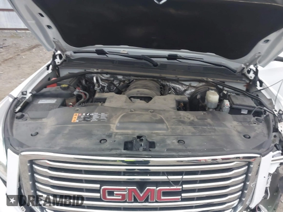 2018 GMC Yukon SLT with VIN 1GKS1BKC3JR279163, listed as a IAAI auction lot 40973940 with 122,445 mi miles. Bid and sale history available at carsss.com. Image 10.