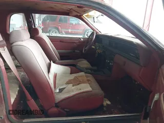 1984 Ford Thunderbird with VIN 1FABP4630EA111572, listed as a IAAI auction lot 41569309 with 7,919 mi miles and . Bid and sale history available at DreamBid. Image 5.