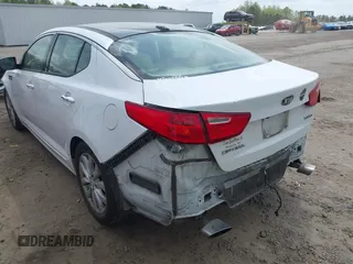 2015 Kia Optima EX z VIN 5XXGN4A71FG491012, wystawiony jako IAAI lot #41934936 z przebiegiem 151 312 mil mil oraz . Historia ofert i sprzedaży dostępna na DreamBid. Obrazek 3.