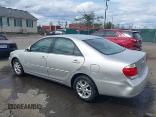 2005 Toyota Camry LE with VIN 4T1BF30K35U608097, listed as a IAAI auction lot 41908838 with 75,601 mi miles and . Bid and sale history available at DreamBid. Image 3.