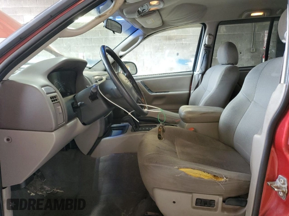 2004 Jeep Grand Cherokee Laredo with VIN 1J4GW48S04C164745, listed as a Copart auction lot 64036725 with 163,054 mi miles and Salvage title. Bid and sale history available at DreamBid. Image 7.