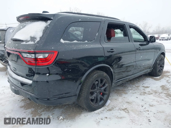 2023 Dodge Durango SRT 392 Premium with VIN 1C4SDJGJXPC681939, listed as a IAAI auction lot 41015100 with 12,562 mi miles and . Bid and sale history available at DreamBid. Image 4.