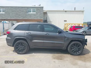 2018 Jeep Grand Cherokee Laredo E with VIN 1C4RJFAG7JC294905, listed as a IAAI auction lot 42452977 with 75,916 mi miles and . Bid and sale history available at DreamBid. Image 13.