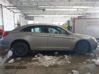 2013 Chrysler 200 Touring with VIN 1C3CCBBB5DN602677, listed as a IAAI auction lot 41644651 with 183,556 mi miles. Bid and sale history available at carsss.com. Image 14.