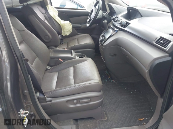 2016 Honda Odyssey EX-L with VIN 5FNRL5H61GB128957, listed as a IAAI auction lot 41953181 with 136,386 mi miles and . Bid and sale history available at DreamBid. Image 5.