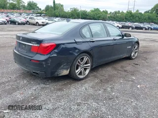 2011 BMW 7 Series 750i xDrive with VIN WBAKC6C57BC394301, listed as a IAAI auction lot 42460658 with 118,600 mi miles and . Bid and sale history available at DreamBid. Image 4.