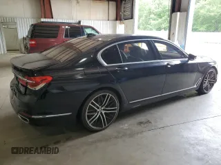 2017 BMW 7 Series 740i with VIN WBA7E2C36HG741125, listed as a Copart auction lot 55754185 with 90,305 mi miles and Clean Title. Bid and sale history available at DreamBid. Image 3.