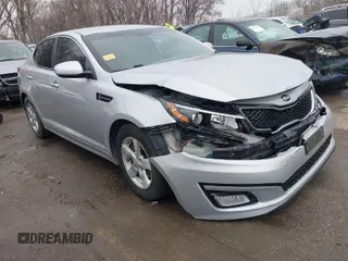 2014 Kia Optima LX z VIN KNAGM4A74E5476622, wystawiony jako IAAI lot #41701835 z przebiegiem 193 086 mil mil oraz . Historia ofert i sprzedaży dostępna na DreamBid. Obrazek 1.