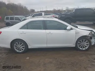2014 Toyota Camry Hybrid LE with VIN 4T1BD1FK0EU115964, listed as a IAAI auction lot 40854548 with 61,731 mi miles. Bid and sale history available at carsss.com. Image 13.