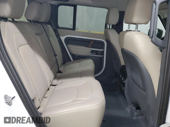 2024 Land Rover Defender S with VIN SALEJ7EX4R2283949, listed as a Copart auction lot 83841744 with 9,824 mi miles and Salvage title. Bid and sale history available at DreamBid. Image 11.