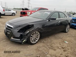 2014 Cadillac CTS Luxury AWD with VIN 1G6AX5S37E0197196, listed as a Copart auction lot 60875285 with 48,277 mi miles and Salvage title. Bid and sale history available at DreamBid. Image 1.
