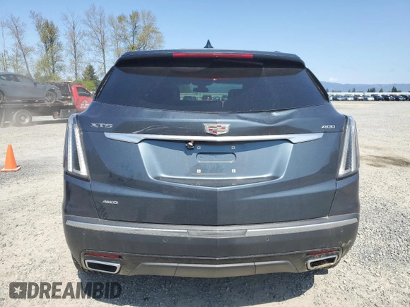 2021 Cadillac XT5 AWD Sport with VIN 1GYKNGRS3MZ176043, listed as a Copart auction lot 49822445 with 44,347 mi miles and Salvage title. Bid and sale history available at DreamBid. Image 6.