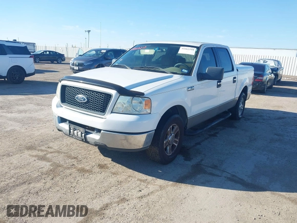 2005 Ford F-150 XLT with VIN 1FTPW12585FA54825, listed as a IAAI auction lot 41662210 with 288,819 mi miles. Bid and sale history available at carsss.com. Image 2.
