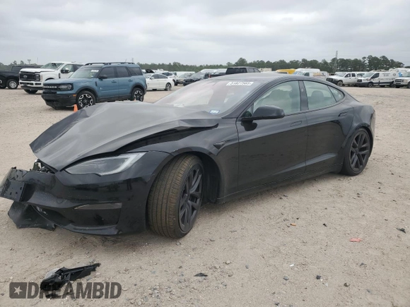 2023 Tesla Model S z VIN 5YJSA1E58PF531166, wystawiony jako Copart lot #51827565 z przebiegiem Nie podano mil oraz Szkoda całkowita • Salvage title. Historia ofert i sprzedaży dostępna na DreamBid. Obrazek 1.