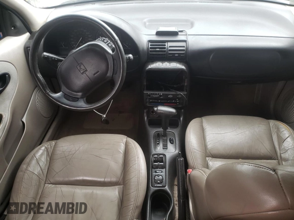 1996 Saturn SL with VIN 1G8ZK5272TZ265571, listed as a Copart auction lot 51267475 with 142,824 mi miles and Salvage Title. Bid and sale history available at carsss.com. Image 8.