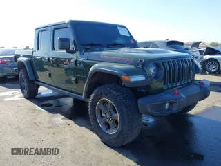 2022 Jeep Gladiator Rubicon z VIN 1C6JJTBG1NL163699, wystawiony jako IAAI lot #41014300 z przebiegiem Nie podano mil oraz . Historia ofert i sprzedaży dostępna na DreamBid. Obrazek 1.