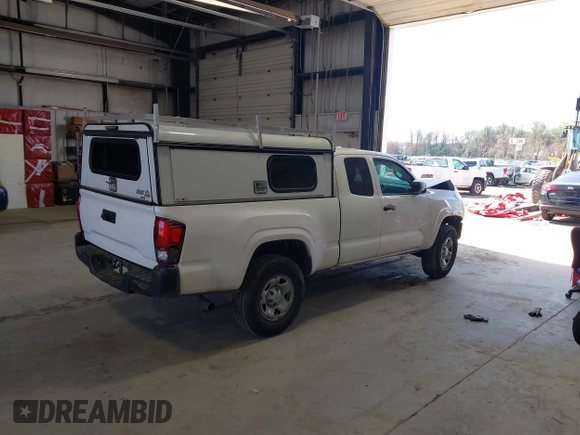 2020 Toyota Tacoma SR with VIN 5TFRX5GN1LX177797, listed as a IAAI auction lot 41882427 with 107,787 mi miles and . Bid and sale history available at DreamBid. Image 4.