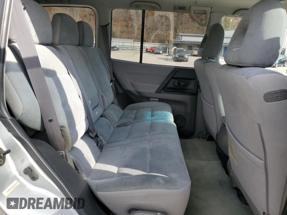 2002 Mitsubishi Montero XLS z VIN JA4MW31R02J005334, wystawiony jako Copart lot #79394064 z przebiegiem 285 949 mil mil oraz Czysty tytuł • Clean title. Historia ofert i sprzedaży dostępna na DreamBid. Obrazek 11.
