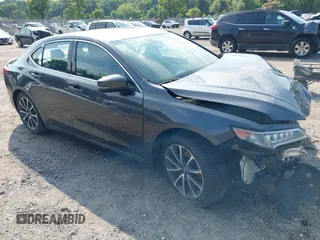 2015 Acura TLX Advance z VIN 19UUB3F7XFA000755, wystawiony jako IAAI lot #42623500 z przebiegiem 119 748 mil mil oraz . Historia ofert i sprzedaży dostępna na DreamBid. Obrazek 1.