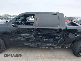 2019 Ram 1500 Big Horn z VIN 1C6RREFT1KN891182, wystawiony jako IAAI lot #41634042 z przebiegiem 128 972 mil mil oraz . Historia ofert i sprzedaży dostępna na DreamBid. Obrazek 14.