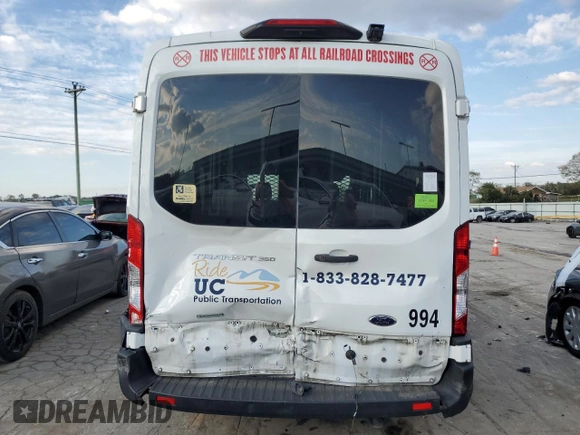 2021 Ford Transit with VIN 1FDAX2CG2MKA23709, listed as a Copart auction lot 74054214 with 105,503 mi miles and Salvage Title. Bid and sale history available at DreamBid. Image 6.
