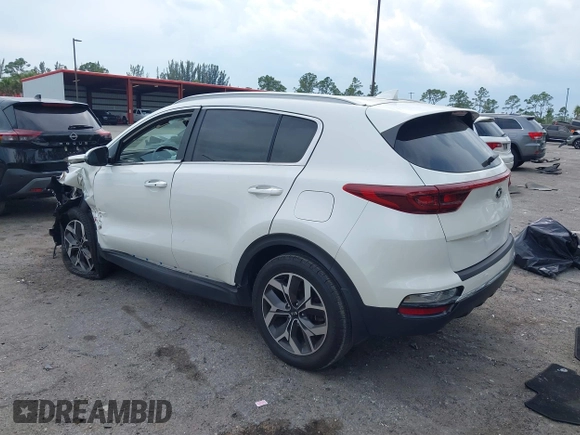 2021 Kia Sportage EX with VIN KNDPN3AC5M7856515, listed as a IAAI auction lot 41879128 with 56,537 mi miles and . Bid and sale history available at DreamBid. Image 3.
