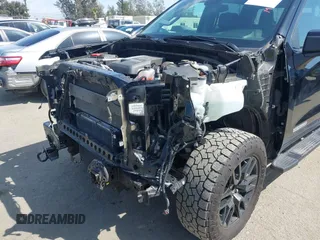 2022 GMC Sierra 1500 with VIN 1GTUUCET2NZ586441, listed as a IAAI auction lot 41957483 with 68,095 mi miles and . Bid and sale history available at DreamBid. Image 6.