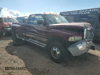 2001 Dodge 3500 with VIN 1B7MF33651J244711, listed as a Copart auction lot 68735784 with 253,795 mi miles and Salvage Title. Bid and sale history available at carsss.com. Image 4.