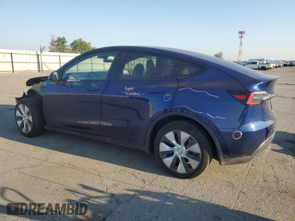 2023 Tesla Model Y Long Range with VIN 7SAYGDEE7PA146322, listed as a Copart auction lot 54071165 with 38,334 mi miles and Salvage Title. Bid and sale history available at DreamBid. Image 2.