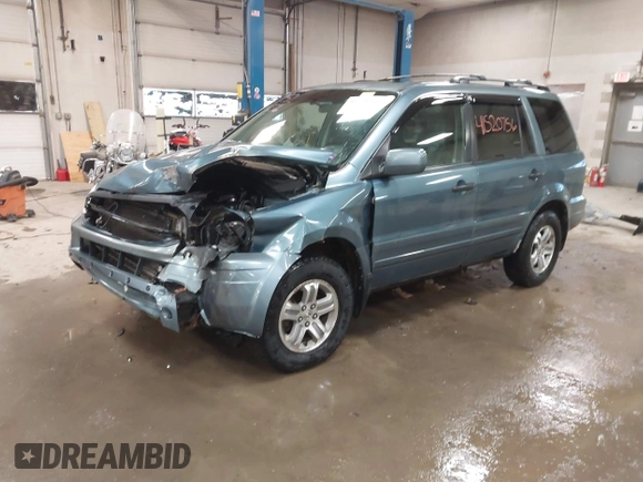 2005 Honda Pilot EX-L with RES with VIN 2HKYF18615H515907, listed as a IAAI auction lot 41520756 with 172,939 mi miles. Bid and sale history available at carsss.com. Image 17.