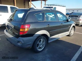 2007 Pontiac Vibe with VIN 5Y2SL65807Z410689, listed as a IAAI auction lot 42036169 with 203,112 mi miles. Bid and sale history available at carsss.com. Image 4.