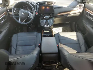 2020 Honda CR-V Touring z VIN 2HKRW2H95LH650860, wystawiony jako Copart lot #55510015 z przebiegiem 68 680 mil mil oraz Szkoda całkowita • Salvage title. Historia ofert i sprzedaży dostępna na DreamBid. Obrazek 8.