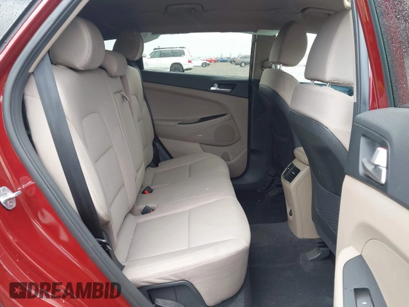 2019 Hyundai Tucson SEL with VIN KM8J33ALXKU855608, listed as a IAAI auction lot 41906199 with 52,741 mi miles. Bid and sale history available at carsss.com. Image 8.