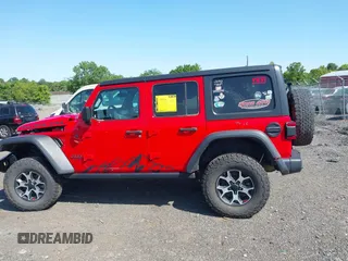 2021 Jeep Wrangler Unlimited Rubicon with VIN 1C4HJXFG2MW575541, listed as a IAAI auction lot 42247475 with 92,353 mi miles and . Bid and sale history available at DreamBid. Image 15.