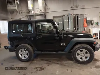 2007 Jeep Wrangler X with VIN 1J8FA24167L230763, listed as a IAAI auction lot 41876090 with 130,136 mi miles and . Bid and sale history available at carsss.com. Image 13.