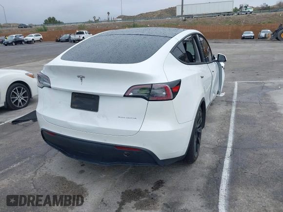 2020 Tesla Model Y Long Range with VIN 5YJYGDEE2LF022484, listed as a IAAI auction lot 41798662 with 108,978 mi miles and . Bid and sale history available at DreamBid. Image 4.