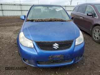 2012 Suzuki SX4 LE with VIN JS2YC5A35C6303573, listed as a Copart auction lot 84844564 with 0 mi miles and Clean Title. Bid and sale history available at carsss.com. Image 5.