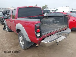 2003 Nissan Frontier XE with VIN 1N6ED27T53C427440, listed as a IAAI auction lot 42407874 with 354,085 mi miles and . Bid and sale history available at DreamBid. Image 3.