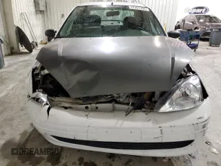 2002 Ford Focus LX with VIN 1FAFP33P52W126344, listed as a Copart auction lot 49757324 with 140,612 mi miles and Salvage Title. Bid and sale history available at DreamBid. Image 5.