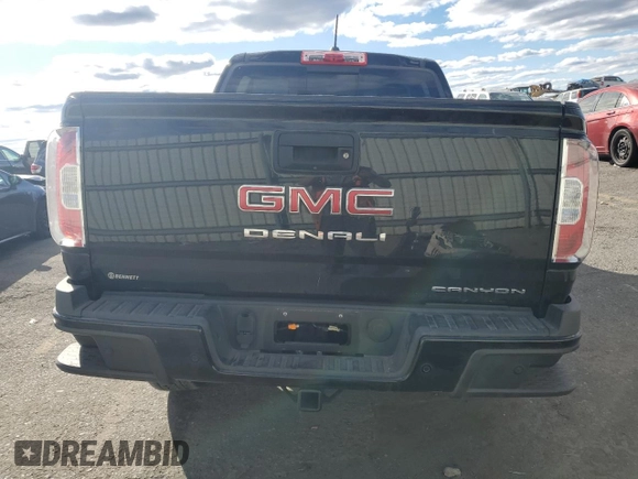 2022 GMC Canyon 4WD Denali with VIN 1GTG6EEN5N1133658, listed as a Copart auction lot 75592304 with 34,715 mi miles and Salvage Title. Bid and sale history available at carsss.com. Image 6.