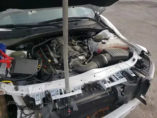 2023 Dodge Charger Police z VIN 2C3CDXAT5PH595165, wystawiony jako Copart lot #51896575 z przebiegiem 6 490 mil mil oraz Szkoda całkowita • Salvage title. Historia ofert i sprzedaży dostępna na DreamBid. Obrazek 13.