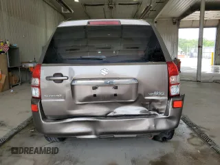 2013 Suzuki Grand Vitara Premium z VIN JS3TE0D60D4100323, wystawiony jako Copart lot #59333335 z przebiegiem 102 368 mil mil oraz Szkoda całkowita • Salvage title. Historia ofert i sprzedaży dostępna na DreamBid. Obrazek 6.