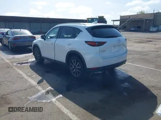 2017 Mazda CX-5 Grand Touring with VIN JM3KFADLXH0222341, listed as a IAAI auction lot 41990464 with 94,374 mi miles and . Bid and sale history available at carsss.com. Image 3.