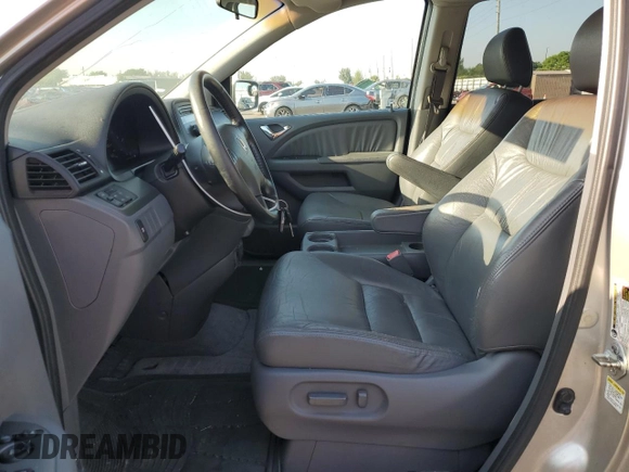 2007 Honda Odyssey EX-L z VIN 5FNRL38697B039741, wystawiony jako Copart lot #56868365 z przebiegiem 135 742 mil mil oraz Czysty tytuł • Clean title. Historia ofert i sprzedaży dostępna na DreamBid. Obrazek 7.