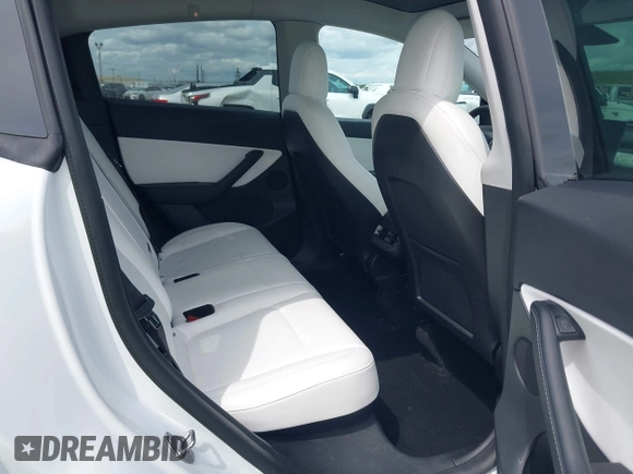 2022 Tesla Model Y Long Range with VIN 7SAYGDEE2NF403354, listed as a IAAI auction lot 41986216 with 53,177 mi miles and . Bid and sale history available at DreamBid. Image 8.
