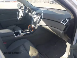 2012 Cadillac SRX Performance Collection z VIN 3GYFNEE30CS652829, wystawiony jako IAAI lot #42156961 z przebiegiem 106 473 mil mil oraz . Historia ofert i sprzedaży dostępna na DreamBid. Obrazek 5.
